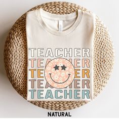 Teacher Shirt, Retro Teacher TShirt, Elementary Teacher Shirt, Team Teacher T Shirts, Rainbow Teacher Tee, Teacher Gift More Grades and Styles Here: https://www.etsy.com/shop/TheGraphicPeach?ref=seller-platform-mcnav§ion_id=34195008 For environmental and human friendly reason, this product is only made when you order. Turnaround time is usually 1-5 business days before shipping, but can increase during holiday periods. Our professional printers always strive to ship as quickly as possible, but f Custom Print Crew Neck T-shirt For Teacher Appreciation, Cotton T-shirt With Funny Print For Teacher Appreciation, Long Sleeve White T-shirt For Teacher Appreciation, White Crew Neck T-shirt For Teacher Appreciation, White Crew Neck Shirt For Teacher Appreciation, Teacher Fits, Teacher T Shirts, Holiday Attire, Cute Shirt Designs