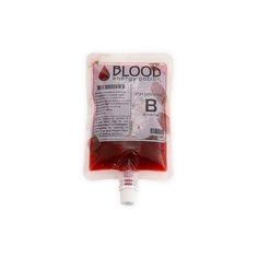 blood bag filled with red liquid on top of a white surface