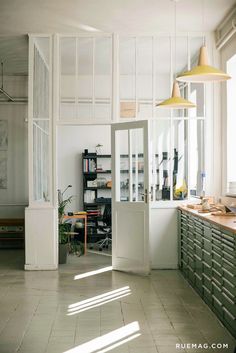 the kitchen is clean and ready to be used as a work space for someone's office