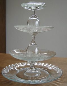 three glass dishes stacked on top of each other