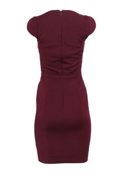 Grab this sleek and classic sheath for some workday polish in a flash! Perfect for pairing with patent pumps and your favorite red lipstick, throw this timeless piece on and get ready to make that meeting in some serious style! Size 2 49% Cotton, 48% Polyester, 3% Elastane Sheath silhouette, cut close to the body V-notch neckline Scalloped short sleeve Fully lined Zippered back Waist 26" Bust 30" Total length 37" Bodycon Dress For Workwear, Workwear Bodycon Dress, Fitted Solid Color Bodycon Dress For Formal Occasions, Stretch Bodycon Dress For Work, Sleek Solid Color Bodycon Formal Dress, Chic Burgundy Bodycon Dress, Chic Fitted Burgundy Bodycon Dress, Classic Stretch Bodycon Dress For Work, Sleek Solid Color Bodycon Work Dress