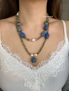 MIntroducing our exquisite Lapis Lazuli and Prehnite Multistrand Necklace--a bold and unique statement piece that effortlessly combines the deep blue of lapis lazuli with the serene green of prehnite. This chunky, natural stone necklace is a perfect accessory for fall and a beautiful addition to any jewelry collection. 💙 Lapis Lazuli Gemstones: Known for its rich, deep blue color with flecks of gold pyrite, lapis lazuli is a stone of wisdom, truth, and self-expression. It adds a touch of elegan Bohemian Lapis Lazuli Beaded Necklace With Gemstones, Blue Gemstone Beads Jewelry For Layering, Blue Gemstone Beads Necklaces For Layering, Blue Multi-strand Gemstone Beaded Necklace, Blue Natural Stones Jewelry For Layering, Blue Jewelry With Natural Stones For Layering, Natural Stone Necklace, Lapis Lazuli Necklace, Necklace Chunky