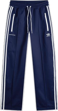 Sporty Blue Joggers With Three Stripes Branding, Blue Sweatpants With Three Stripes For Streetwear, Sporty Adidas Joggers With Relaxed Fit, Adidas Athleisure Sweatpants For Streetwear, Adidas Joggers For Streetwear, Adidas Sporty Joggers For Streetwear, Blue Activewear With Three Stripes For Streetwear, Adidas Athleisure Joggers For Streetwear, Athleisure Adidas Logo Joggers For Streetwear