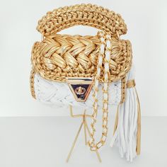 Handmade Shoulder and Crossbody Bag with Luxury Metallic Yarn The bag is completely handmade. It is custom made for you in the color of your choice.  It is the most fashionable bag of 2022 with its golden color chain, ring, clasp and lock accessories.  It is a nice bag that you can use both in sports style and daily with its tassel and handle details.  Optionally, you can easily remove the chain and tassel details and use them according to your style.  It will complement your elegance with daily and evening dresses. Suitable for any style.  A universal accessory for a fashionable and an original look. Unique and original. It can store cosmetics, keys, books, phones, etc. items can fit comfortably. It can be a great gift for you, your loved ones, friends, girlfriend and mom. It will also be White Crochet Satchel With Braided Handles, White Crochet Handheld Bag With Braided Handles, White Handheld Crochet Bag With Braided Handles, White Crochet Top Handle Bag, White Crochet Crossbody Bag With Braided Handles, White Crochet Crossbody Bag For Gifts, White Crochet Top Handle Bag With Braided Handles, White Crochet Crossbody Shoulder Bag, Handmade White Pouch Shoulder Bag