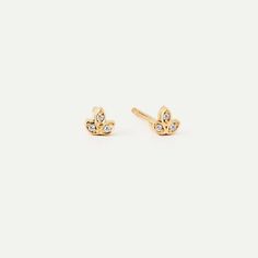 These Diamond Lotus Stud Earrings in 14K Gold are a striking blend of sophistication and simplicity. Dainty flower designs, studded with sparkling diamonds, make these earrings an exquisite choice for any woman. Made with 14k solid gold, they offer durability and long-lasting shine. Ideal as a gift for a loved one, these diamond leaf studs will complement any outfit, lending a hint of elegance and charm to your everyday style. 14k solid gold handcrafted pieces 100% ethical sourced jewelry Materi Wedding 14k Gold Diamond Earrings, Flower Shape, Classic Diamond Flower-shaped Earrings, 14k Gold Diamond Flower-shaped Earrings As Gift, Diamond Flower-shaped Earrings With Accents, Yellow Gold Flower-shaped Diamond Earrings With Accents, Real Gold Jewelry, Recycled Gold, Perfect Gift For Her, Sparkle Diamonds