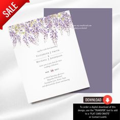 a wedding card with purple flowers on it