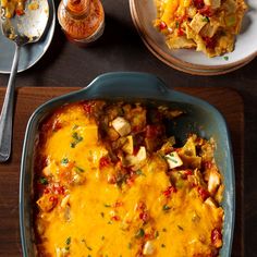 a casserole dish with meat and vegetables in it