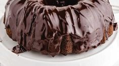 a chocolate bundt cake on a white plate