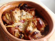 a close up of a bowl of food on a table