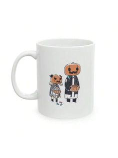 a white coffee mug with two bears on it