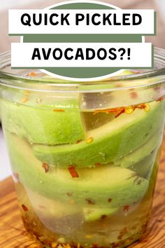 pickled avocados in a jar with text overlay that reads quick pickled avocados?