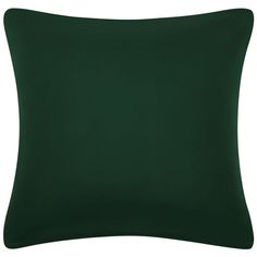 a dark green pillow on a white background