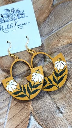 This listing is for one pair of handpainted wood earrings with nickel free gold color hardware. All designs are completely created by Michele Norman. Main color: Yellow Earring length (not including hardware): 2" Artsy Hand Painted Everyday Earrings, Hand Painted Artsy Earrings For Everyday, Everyday Hand Painted Artsy Earrings, Artsy Hand Painted Earrings For Everyday, Hand Painted Bohemian Earrings For Everyday, Hand Painted Yellow Artsy Earrings, Yellow Hand Painted Artsy Earrings, Hand Painted Drop Earrings For Everyday, Everyday Hand Painted Gold Earrings