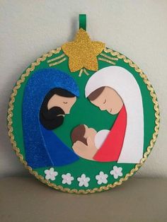 a christmas ornament with a nativity scene on it