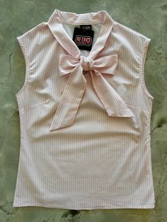 a flat lay of our bow tie blouse with pink and white vertical stripes Bow Top, Retro Tops, Vintage Lover, 50s Fashion, Dream Clothes, Cotton Top, Fashion Killa, Cute Tops, The Vintage