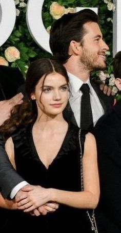 the actors are posing together on the red carpet at the golden globe awards in los angeles