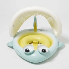 an inflatable toy with two eyes and a banana on the inside is shown