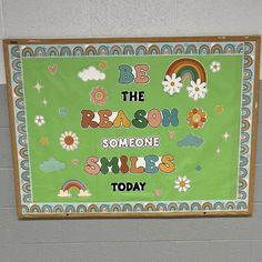 a bulletin board that says be the reason someone smiles today