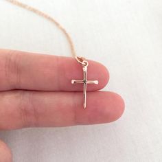 Simple Rose Gold Cross Necklace, Baptism Necklace, First Communion Jewelry, Baptism Gift, Christening Gift, Godmother Necklace, StampedEve♥ Available in Sterling Silver and Rose Gold.♥ Specification. Chain and Components are Sterling Silver/ 14K Rose Gold Filled. Cross is Sterling Silver or Rose Gold Vermeil ( Rose Gold Plated over Sterling Silver ) size 11.5 x 20.5mm. Comes in a satin pouch. Length includes jump ring and clasp♥ IMPORTANT:Usually jewellery in the pictures looks bigger than in re Cross Jewelry For Confirmation And Mother's Day, Rose Gold Cross Necklace As A Gift, Gift Rose Gold Crucifix Cross Necklace, Cross Jewelry For Baptism And Mother's Day, Mother's Day Baptism Cross Jewelry, Baptism And Mother's Day Cross Pendant Jewelry, Godmother Necklace, Satin Pouch, Simple Rose