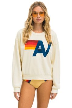 LOGO RELAXED CREW SWEATSHIRT - VINTAGE WHITE - Aviator Nation Aviator Nation Crewneck, Aviator Nation Outfit, Aviator Nation Sweatshirt, Aviator Nation Logo, Character Closet, Malibu Rising, College Wardrobe, Dream Wishlist, Spain Trip