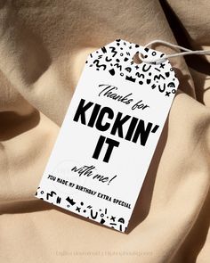 a white tag that says thank you kickin'it with black and white designs