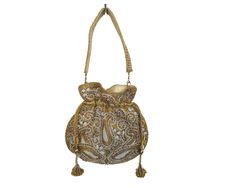 Indian Potli Bags For Parties, Wedding And Festivals, Pearl Evening Bag With Wrist Strap, Pearl Drawstring Bags The potli bag holds a significant place in the cultural heritage of ancient Bhopal, linking back to early tribal traditions that crafted ornaments from various materials. Initially recognized by the Begums (Female Rulers), who added a Persian touch, the craft has evolved into an integral aspect of Nawabi Culture. Today, the beaded potli bags are part of the rich cultural heritage of th Batwa Bags, Potli Bag, Potli Bags, Wedding Bag, Drawstring Bags, Cultural Heritage, Small Accessories, The Craft, Wrist Strap