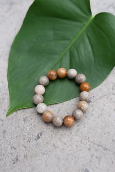 This bracelet is made of glass beads in colors that remind you of a summers day on a beach with sand between your toes. Each of the beads are approximately 2/3" W and come in gray, neutral and brown.. A stretch bracelet that can be worn everyday and every season. A perfect gift for you or your loved ones, you will want to buy several because they look even better when stacked! Handcrafted by and sold in support of vulnerable women in Thailand. *Set Free Special valid 9/8-14/22* Strawberry Lip Balm, Celebrate Recovery, Orange Lips, Ceramic Tea Set, Stretch Bracelet, Stretch Bracelets, Rope Bracelet, Post Earrings, Glass Beads