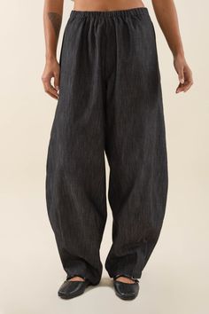 Long Cotton Blend Denim Lantern Pant Baggy Denim Harem Pants, Baggy Wide Leg Harem Pants With Pull-on Style, Baggy Wide-leg Jeans With Elastic Waistband, Baggy Wide Leg Jeans With Elastic Waistband, Wide Leg Denim Harem Pants With Pockets, Baggy Dark Wash Pants With Elastic Waistband, Baggy Dark Wash Bottoms With Elastic Waistband, Black Denim Pants With Elastic Waistband, Baggy Jeans With Elastic Waistband