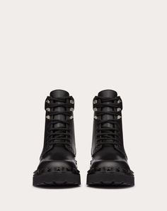 Valentino Garavani Rockstud combat boot in calfskin - Welt with tone-on-tone studs detail - Rubber lug sole - Heel height: 50 mm / 2 in. with 25 mm / 1 in. platform - Shaft height: 15 cm / 5.9 in.; Italian size 37 - Made in Italy Woman In Black, Combat Boot, Valentino Rockstud, Lug Sole, Valentino Garavani, Online Boutique, Combat Boots, Calf Skin, Heel Height