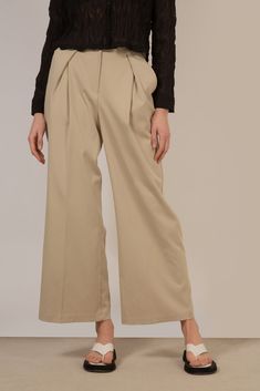 - Fit: True to size- Materials: 100% polyester- Thickness: Moderate- Sheerness: None- Stretch: Low- Lining: None- Care: Gentle wash cold and dry in shade Beige Wide Leg Culottes For Workwear, Full Length Culottes For Work, Beige Wide Leg Dress Pants For Fall, Beige Wide Leg Office Pants, Beige Wide Leg Pants For Office, Beige Wide Leg Dress Pants, Beige Wide Leg Full Length Pants For Fall, Beige Full Length Wide Leg Pants For Fall, Beige Wide Leg Pants For Fall