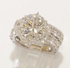 a diamond ring with two rows of diamonds around it