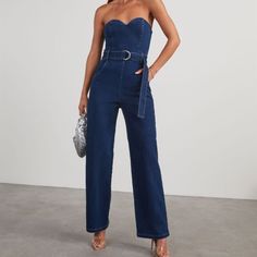 Denim Jumper Strapless Blue Denim High-waist Strapless Jumpsuit, Chic Wide-leg Denim Jumpsuit, Casual Fitted Denim Blue Strapless Jumpsuit, Summer Fitted Denim Blue Strapless Jumpsuit, Summer Denim Blue Strapless Jumpsuit, Fitted Denim Blue Strapless Jumpsuit For Summer, Fitted Denim Jumpsuit For Party, Fitted High-rise Denim Strapless Jumpsuit, Summer Denim Fitted Strapless Jumpsuit