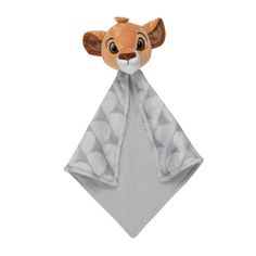 a stuffed animal wrapped in a gray towel