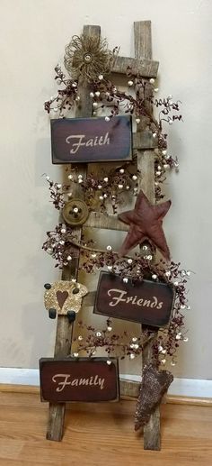 a christmas tree made out of wooden planks and some decorations on top of it