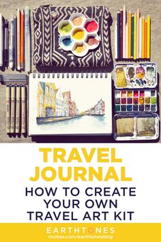 travel journal with art supplies on the beach