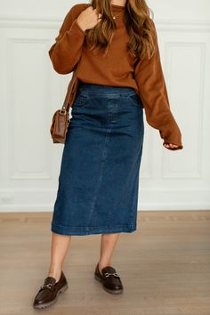 Add a little flair and contrast to your outfit with the 'Margaret' denim mid skirt! This midi skirt features stretch denim and a flattering silhouette for a comfortable fit all day. Pair with a fitted top and white sneakers for a fun and casual ensemble for a day out at the park! Exclusively designed by us with you in mind. 97% Cotton, 3% Spandex Hand Wash Cold Hang or Lay Flat to Dry Iron Low Heat Do Not Bleach Do Not Dry Clean Functional front & back pockets! Slight flared/A-Line Style Model H Chambray Skirt Outfit, Midi Denim Skirt Outfit Fall, Midi Jeans Skirt Outfit, Denim Skirt Outfit Fall, Midi Jeans Skirt, Denim Midi Skirt Outfit, Jean Skirt Outfits, Chambray Skirt, Midi Skirt Outfit