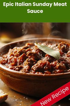 A steaming bowl of rich, rustic Epic Italian Sunday Meat Sauce with chunks of tender meat simmered in tomato sauce, garnished with a bay leaf and grated cheese on top. Steam rises from the traditional earthenware serving dish against a dark background.