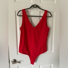 New - Never Worn Bought From Amazon Red Bodysuit With A V-Neck Tank Top Style Red Fitted V-neck Bodysuit, Fitted Red V-neck Bodysuit, Red Sleeveless Lined Bodysuit, Red V-neck Bodysuit For The Beach, Red V-neck Swimwear For Party, Red Bodysuit, V Neck Bodysuit, V Neck Tank Top, Wearing Red