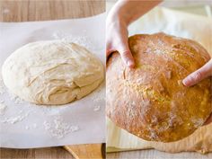 a person holding a loaf of bread on top of a wooden cutting board next to a round loaves of bread