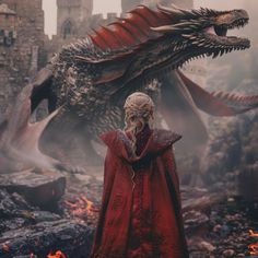 a woman standing in front of a dragon