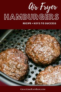 hamburgers cooking in an air fryer with the words air fryer hamburgers recipe keys to success