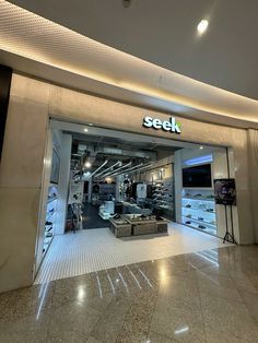 a store front with the word seek on it