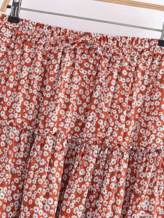 The Averly Boho Mini Skirt is the perfect piece to add a touch of bohemian flair to any outfit. The elasticated waistband provides a comfortable and flattering fit, while the tiered hemline creates a fun and flirty look. The skirt is available in two beautiful prints: leopard and floral. Specs: High rise Mini length Material: Cotton, Rayon Casual Flowy Tiered Skirt, Flowy Tiered Casual Skirt, Bohemian Flowy Maxi Skirt With Layered Hem, Summer Bohemian Tiered Maxi Skirt, Bohemian Tiered Maxi Skirt For Summer, Bohemian Bottoms With Tiered Layered Hem, Bohemian Tiered Bottoms With Layered Hem, Casual Maxi Skirt With Layered Hem, Casual Tiered Bottoms With Floral Print