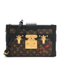 This is an authentic LOUIS VUITTON Monogram Petite Malle in Black. This trunk-style bag is crafted of Louis Vuitton monogram on coated canvas. The bag features black leather trim, an optional, adjustable black leather shoulder strap, and crossover top flap with gold-toned press lock and buckles on either side. The corners are reinforced with black hardware end caps. The bag opens to a beige leather interior with a patch pocket. Crossover Top, Black Hardware, Leather Interior, Leather Trim, Authentic Louis Vuitton, Leather Trims, Louis Vuitton Monogram, Crossover, Patch Pocket