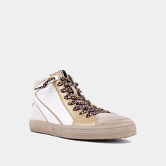 Our ROONEY high-top sneakers are designed with a vintage basketball style that is both unique and versatile. This particular pair is crafted from faux leather lizard skin, synthetic suede, and features gold embellishments. The sneakers can be paired with a wide variety of outfits, ranging from skirts and track pants to tailored attire. Basketball Style, Lizard Skin, Vintage Basketball, Loafer Mules, Of Outfits, Sneaker Heels, Boot Sandals, Mule Clogs, Mommy And Me