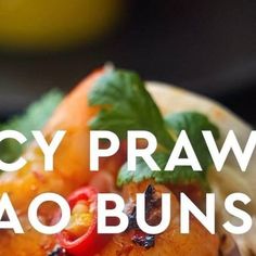 taco buns with spicy praw and avocado garnish on top