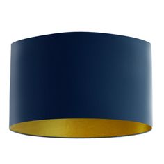 a blue and gold lamp shade on a white background