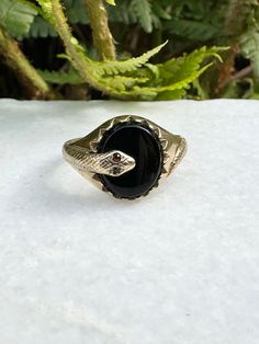 Vintage 9ct gold onyx snake ring, garnet eyes, hallmarked. Weight 3.2g. UK size T, US size 9.75. Gemstone Snake Ring Fine Jewelry, Anniversary Gemstone Snake Ring, Anniversary Snake Ring With Gemstone, Antique Hallmarked Snake Ring, Hallmarked 14k Gold Snake Ring, 14k Gold Hallmarked Snake Ring, Fine Jewelry Anniversary Snake Ring In Oval Shape, Oval Snake Ring For Anniversary, Fine Jewelry, Oval Snake Ring For Anniversary In Fine Jewelry