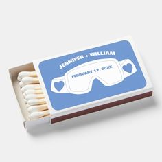 matchbox with matches in the shape of glasses