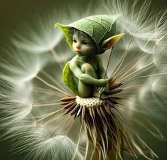 a little elf sitting on top of a dandelion